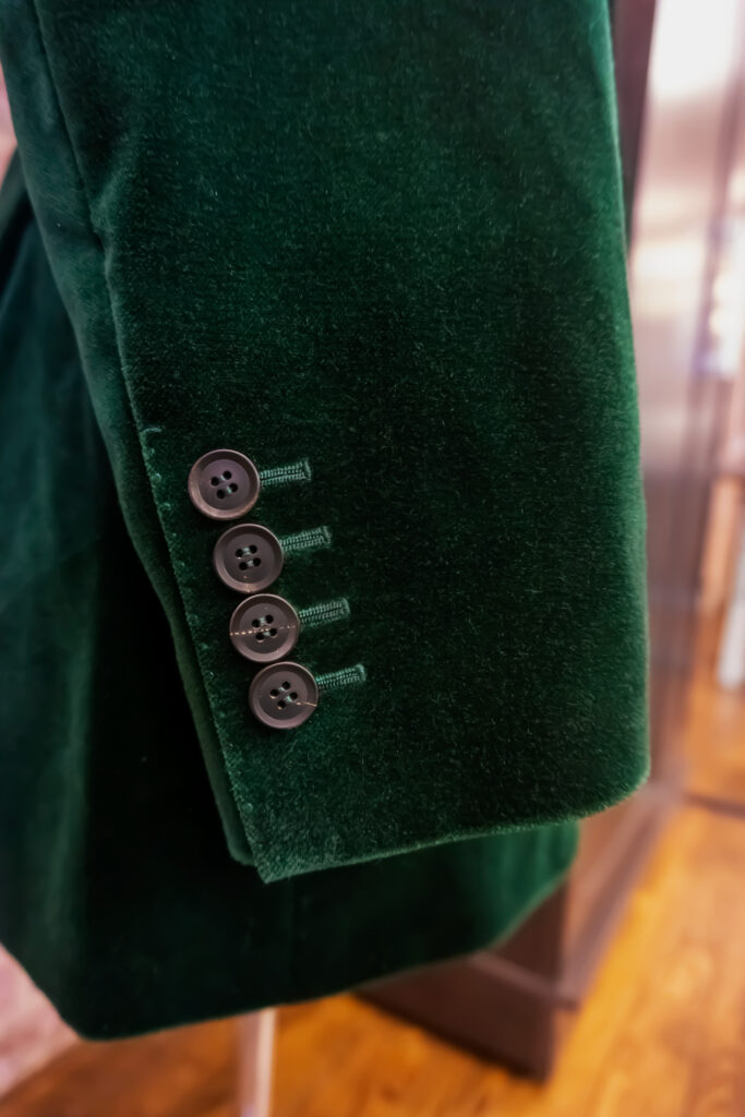 bespoke buttonholes for surgeon cuffs on a green velvet tux.